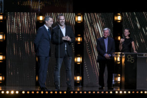 MAXIME BRAULT/STARFACE | Les acteurs français Gad Elmaleh et grec Christos Loulis rendant hommage au réalisateur Costa-Gavras, à droite